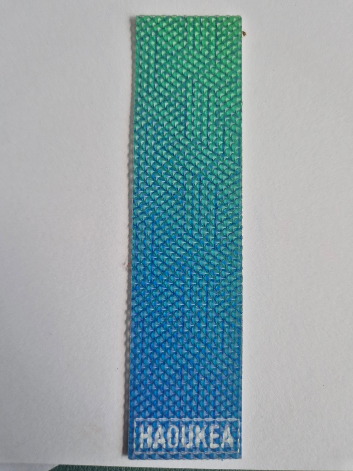 Sensory abrasive strip with sticky back